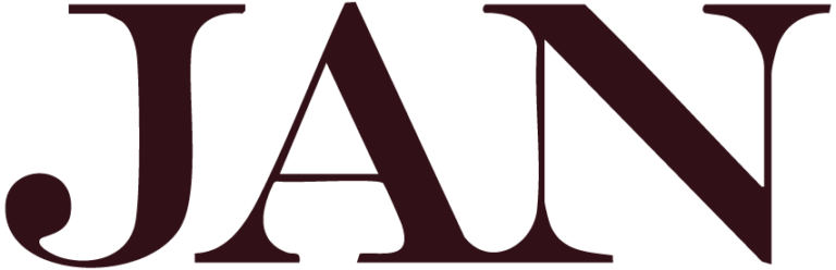 De letters JAN in groot, vet, donker kastanjebruin schreeflettertype op een lichtgrijze achtergrond.